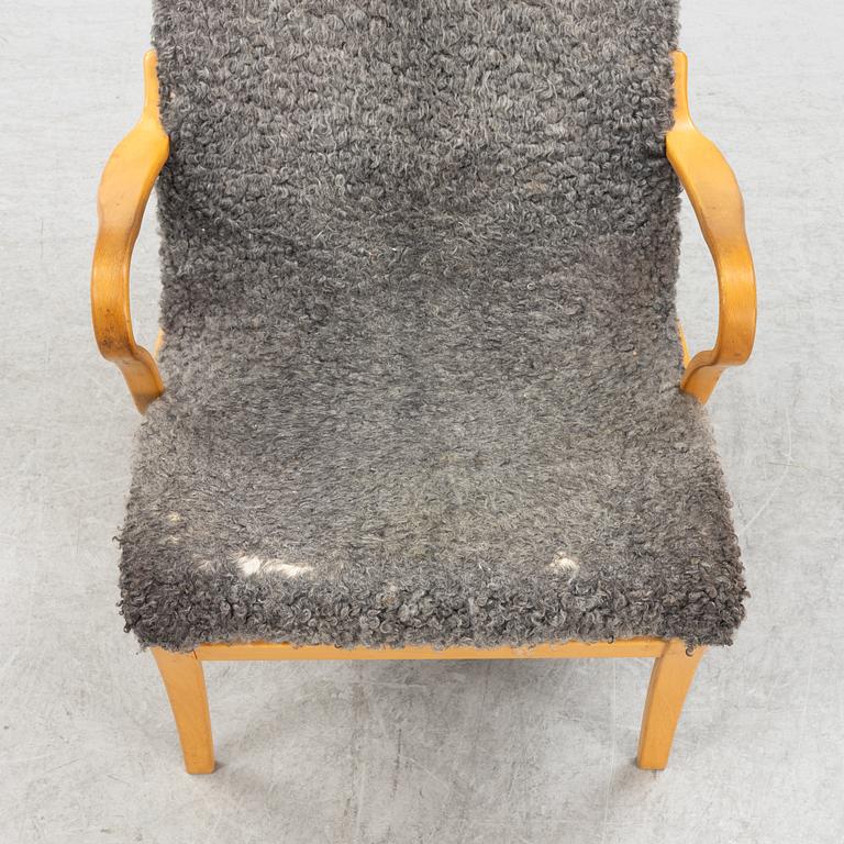 Bruno Mathsson, fåtölj och fotpall "Pernilla", Bruno Mathsson International 2004.