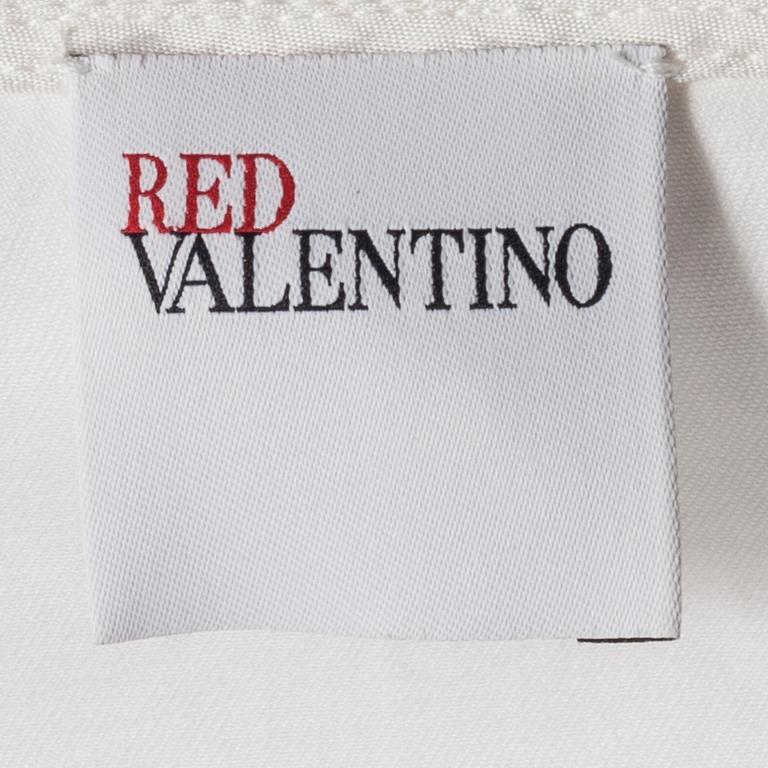 VÄST, Red Valentino.