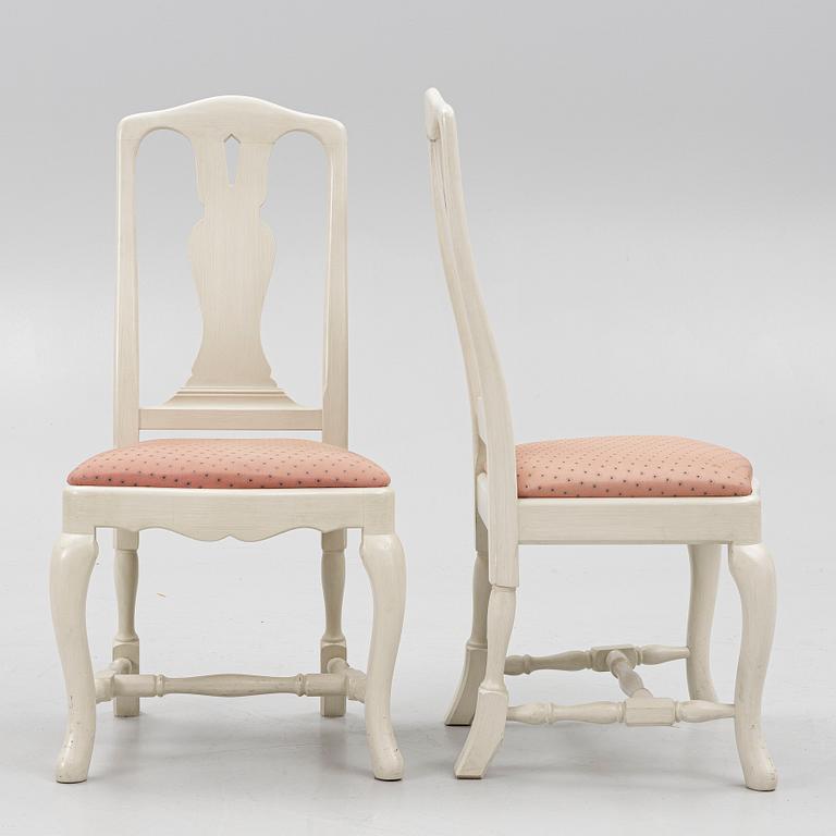 A Rococo style dining table and twelve chairs, KA Roos, Helsingborg, modern production.