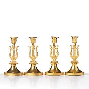 Four Russian Empire candlesticks, beginning of the 19th century.