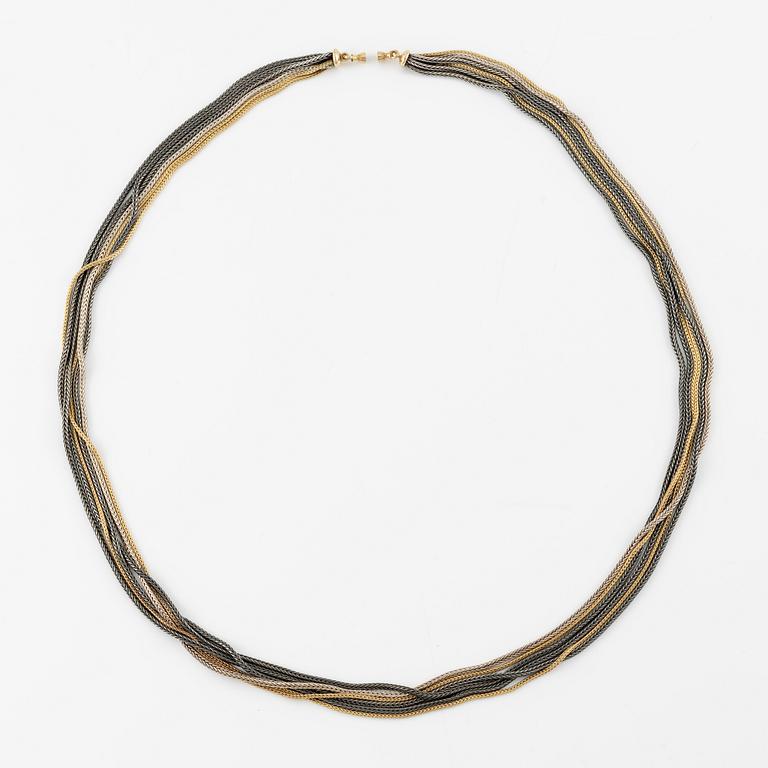 Collier, troligen Ole Lynggaard, sex rader, guld och silver.