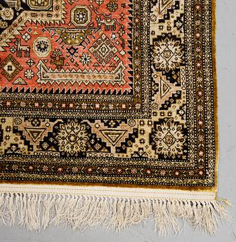 A rug, an old silk Qum, ca 158 x 104,5 cm (as well as ca 2 cm flat weave at the ends).