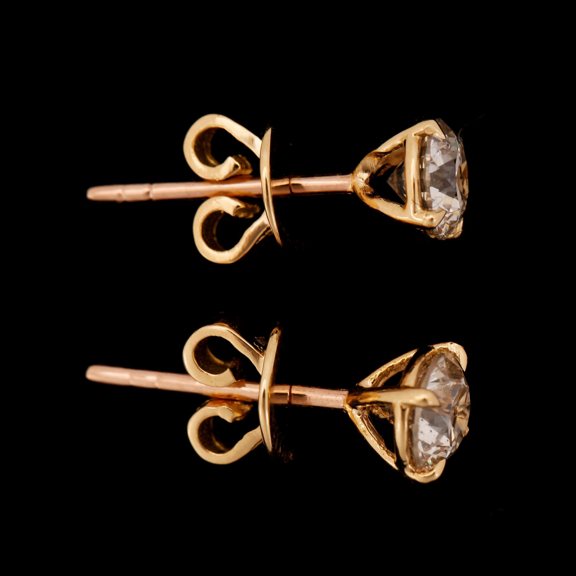 ÖRHÄNGEN, ett par, 18k guld med briljantslipade diamanter tot ca1,04ct. 2000-tal.