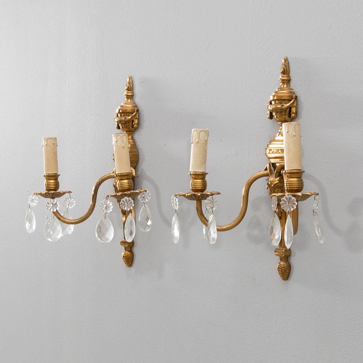 Pair of Louis XVI-style sconces, first half of the 20th century.