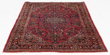 An American Sarouk rug, semi antique, c. 200 x 133 cm.