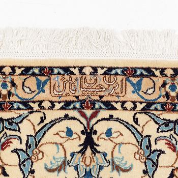 A carpet, Nain, part silk, fine 9 laa, signed, ca 327 x 210 cm.