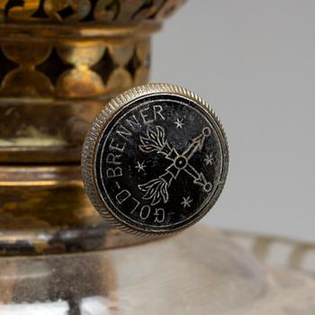 A brass oil lamp, late 19th Century.