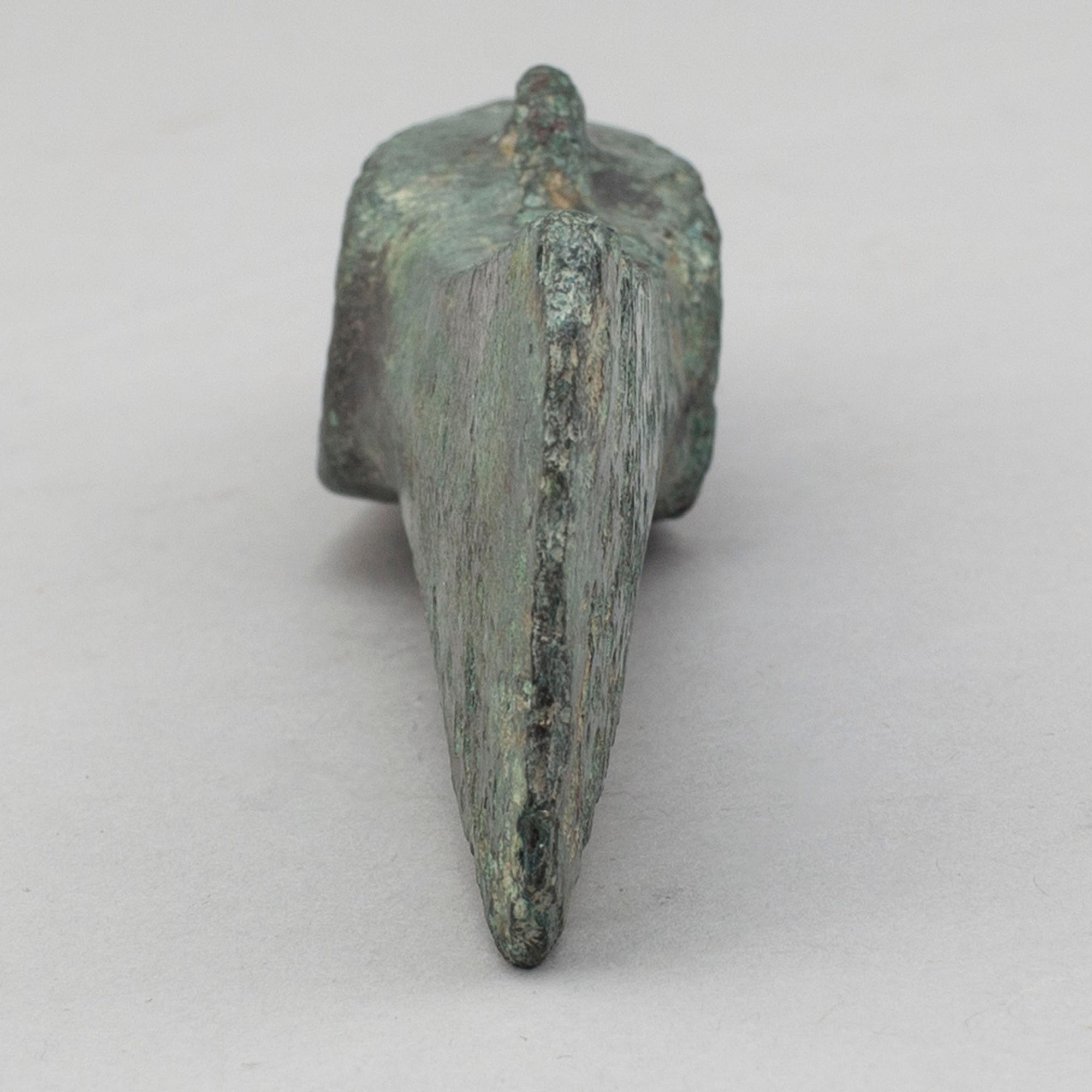 A bronze axe, 1500-500 B.C.