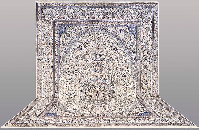A CARPET, Nain part silk, s.k 9 LAA, 588 x 393 cm.