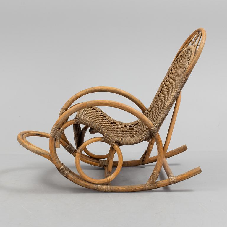 a rattan and bamboo rocking chair from the second half of the 20th century.