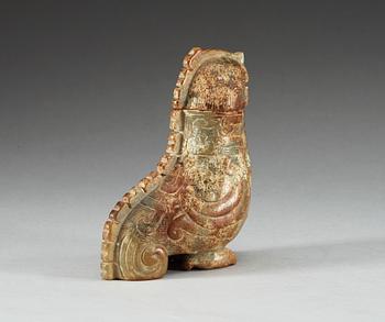 An archaistic nephrite bird shaped covered vessel.