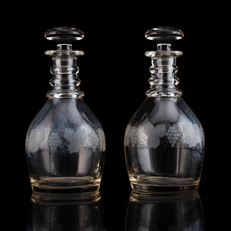 A pair of mid 19th century glass decanters and stoppers.