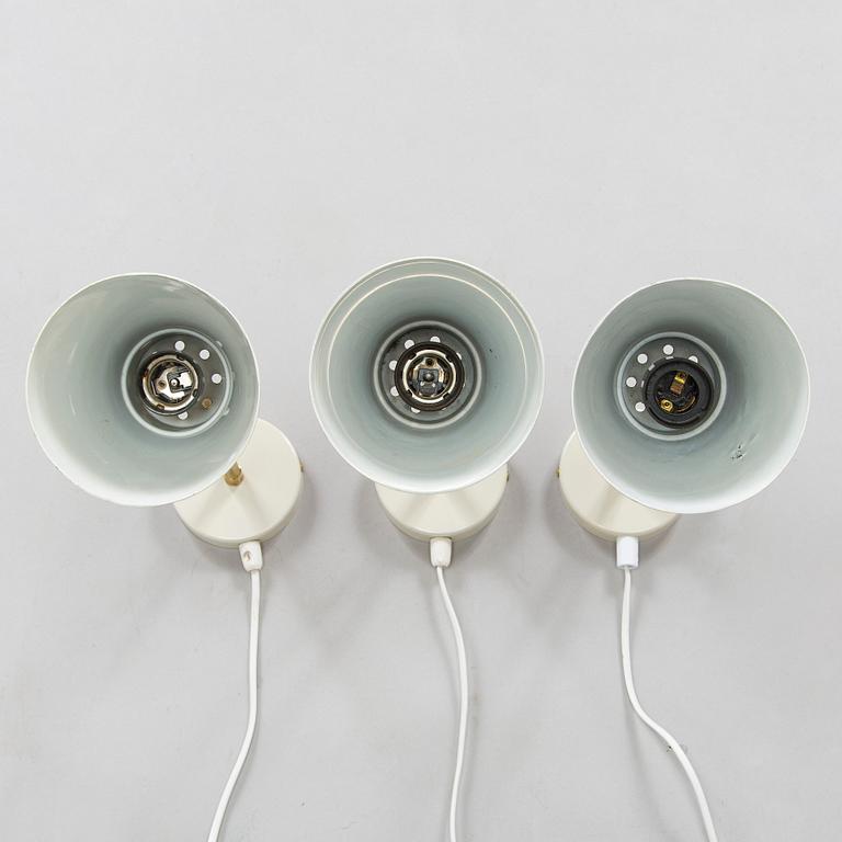 A set of three mid-20th century wall lights, model AH6, for Itsu Finland.