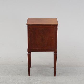 A mahogany bedside cabinet by Carl Johanssons Möbleringsaffär, around the year 1900.