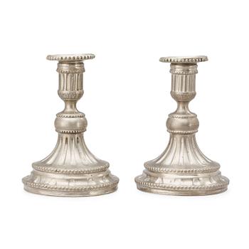 528. A pair of Gustavian pewter candlesticks dated 1785.