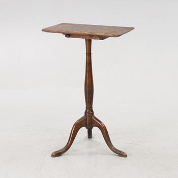 A folding table, early 19th century.