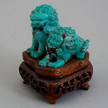 A Chinese carved turquoise sculpture, 20th century.