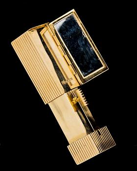 A 18k gold lipstick case.