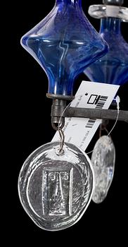 LJUSKRONA, glas, järnsmide, Erik Höglund. H 63.