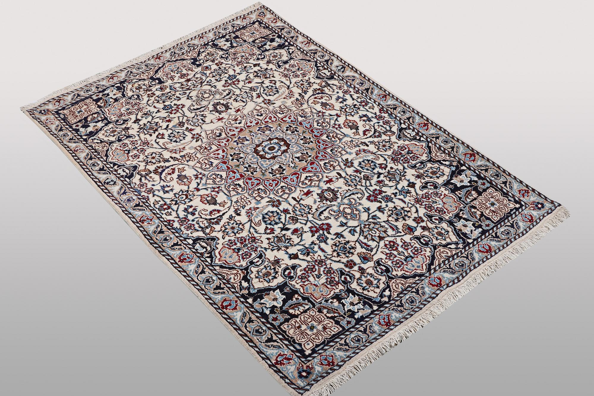 A rug, Nain, part silk, ca 196 x 120 cm.