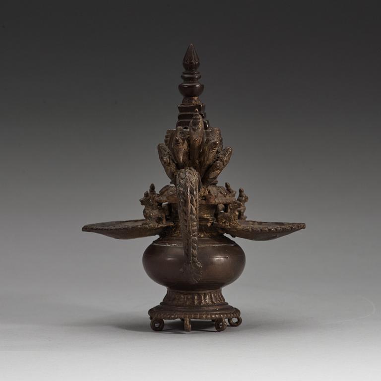 A copper alloy Tibetan/Nepalese Butter Lamp 'Sukunda', 19th Century.