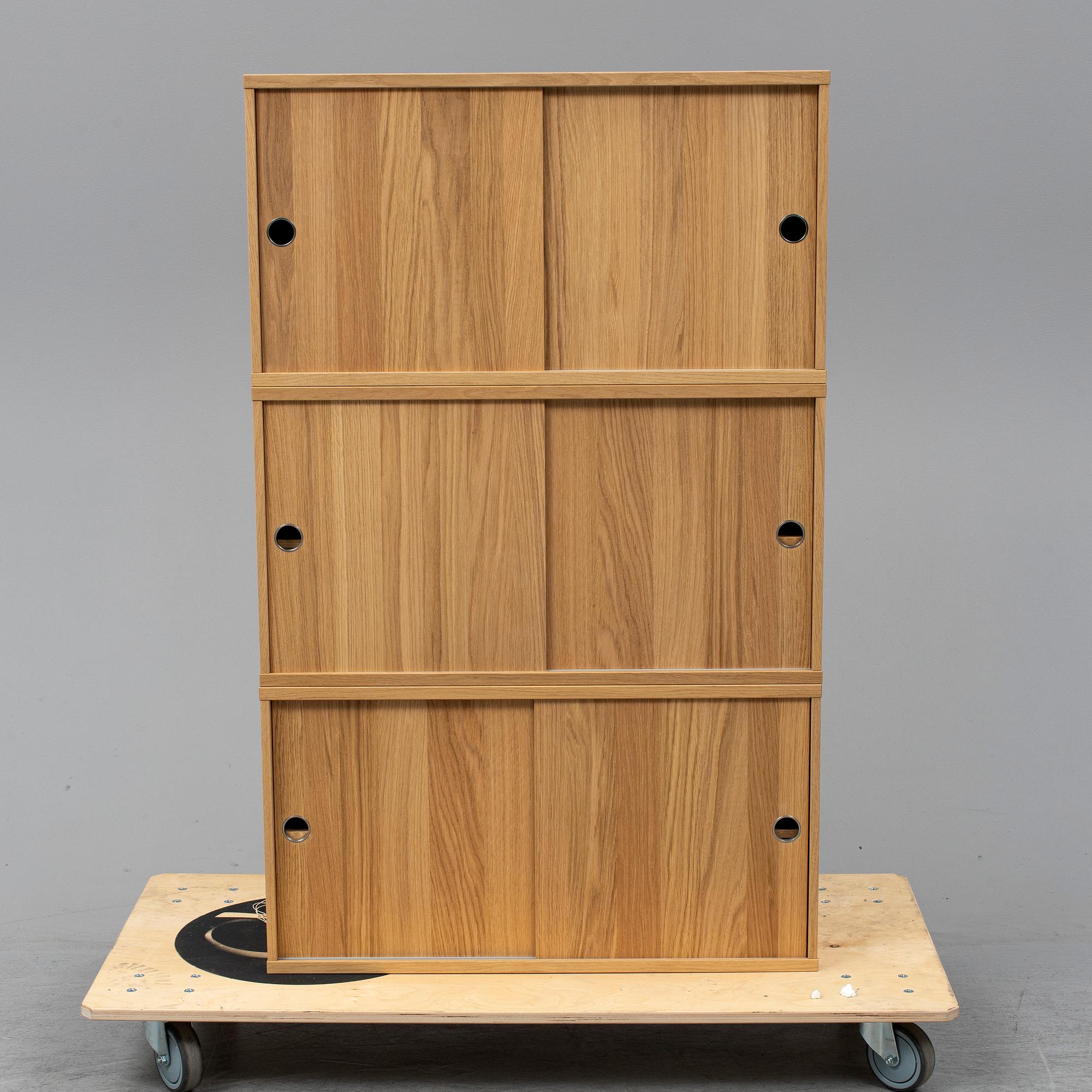 NILS STRINNING, 3 oak 'String' cabinets.