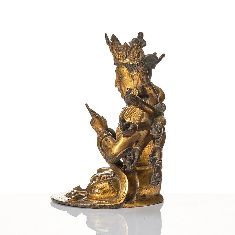 A gilt-bronze figure of a Boddhisattva, Ming dynasty (1638-1644).