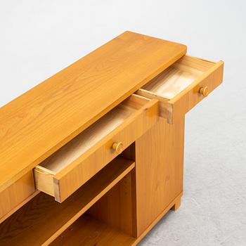 An elmwood-veneered bookcase, Nilsson & Johansson Möbelfabrik, Björnum, mid 20th century.