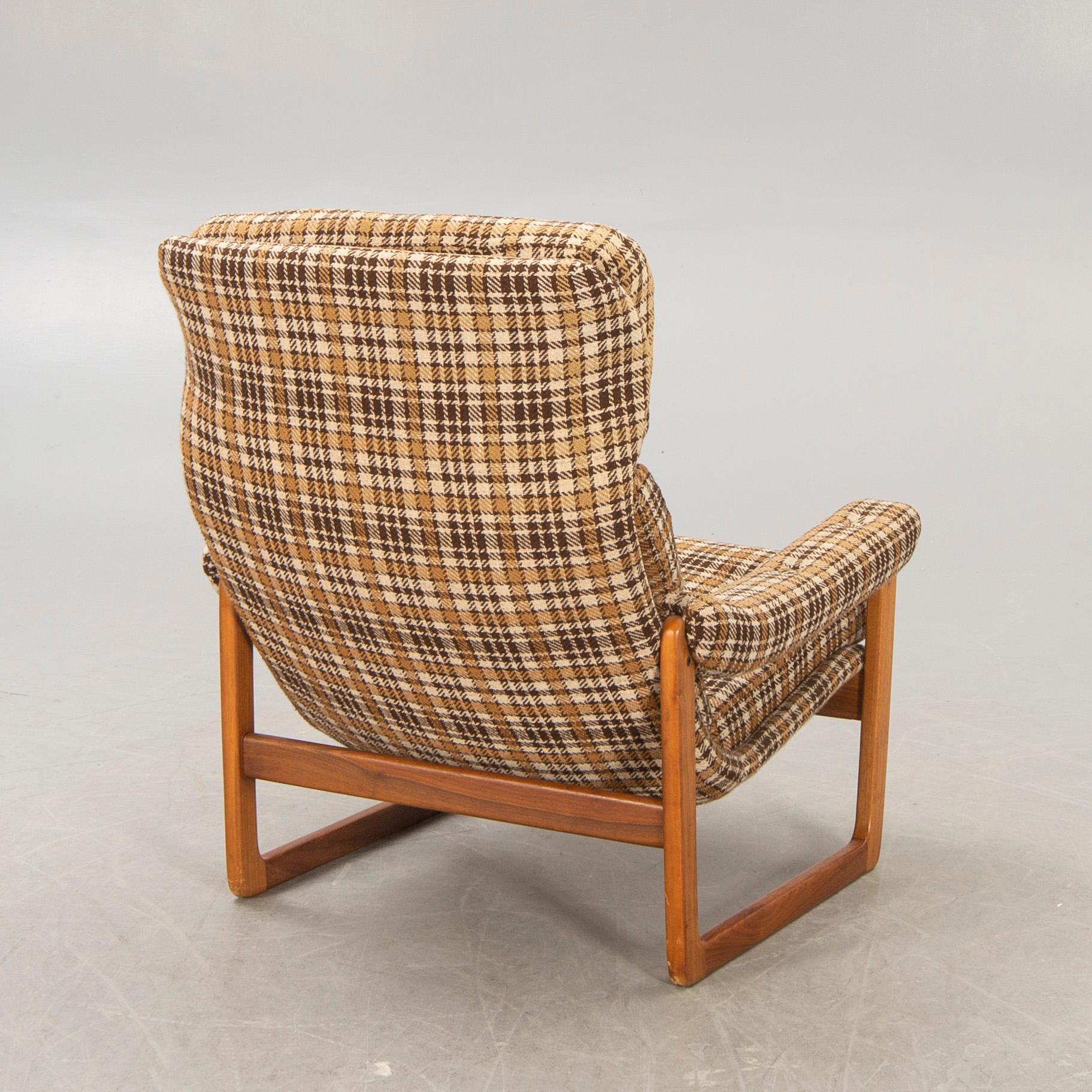 An Inge Andersson walnut "Draken" easy chair late 1960s.