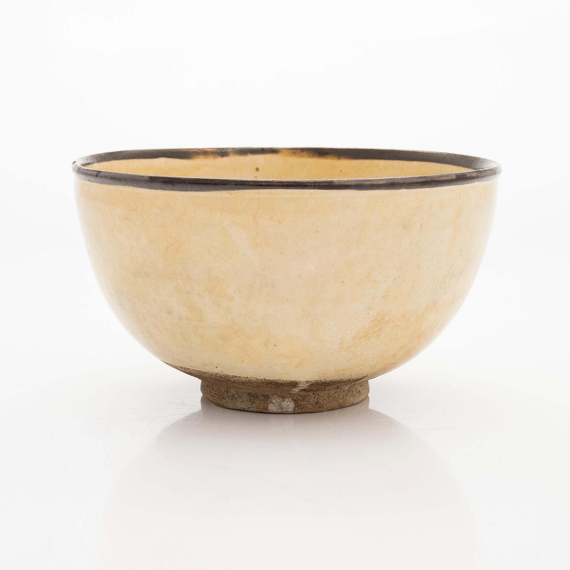 A creme glazed bowl, presumably Song/Yuan dynasty.