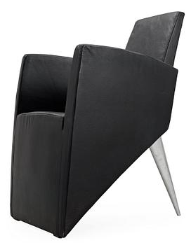 652. A Philippe Starck 'J Serie Lang' black leather and cast aluminium lounge chair, by Aleph, Italy.