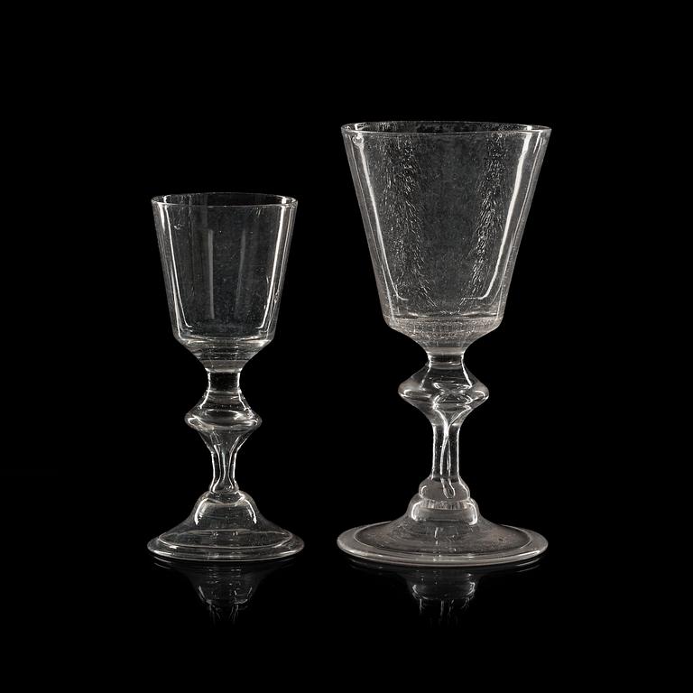 A set of 16 wine glasses and 11 smaller wine glasses, the latter part of 18th Century.