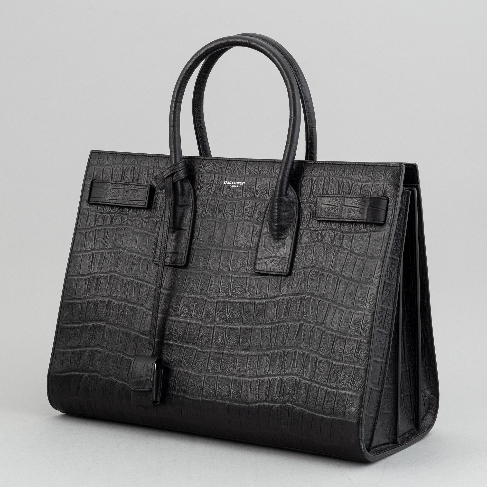 Yves Saint Laurent, a crocodile embossed 'Sac de Jour' leather handbag.