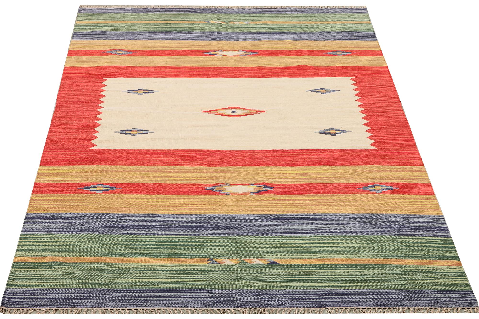 A Durry carpet, c. 300 x 200 cm.