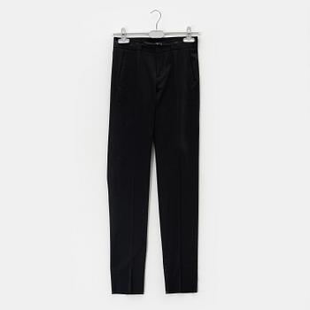 Gucci, a pair of black pants, size 38.