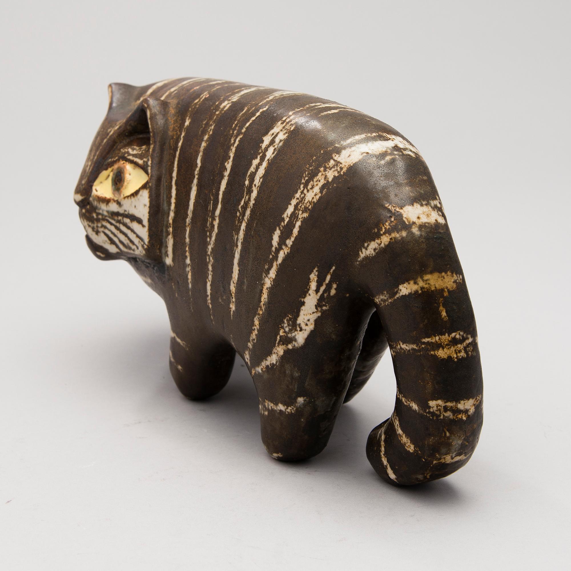 A Ceramic Figurine, signed T Kaasinen Arabia Finland.