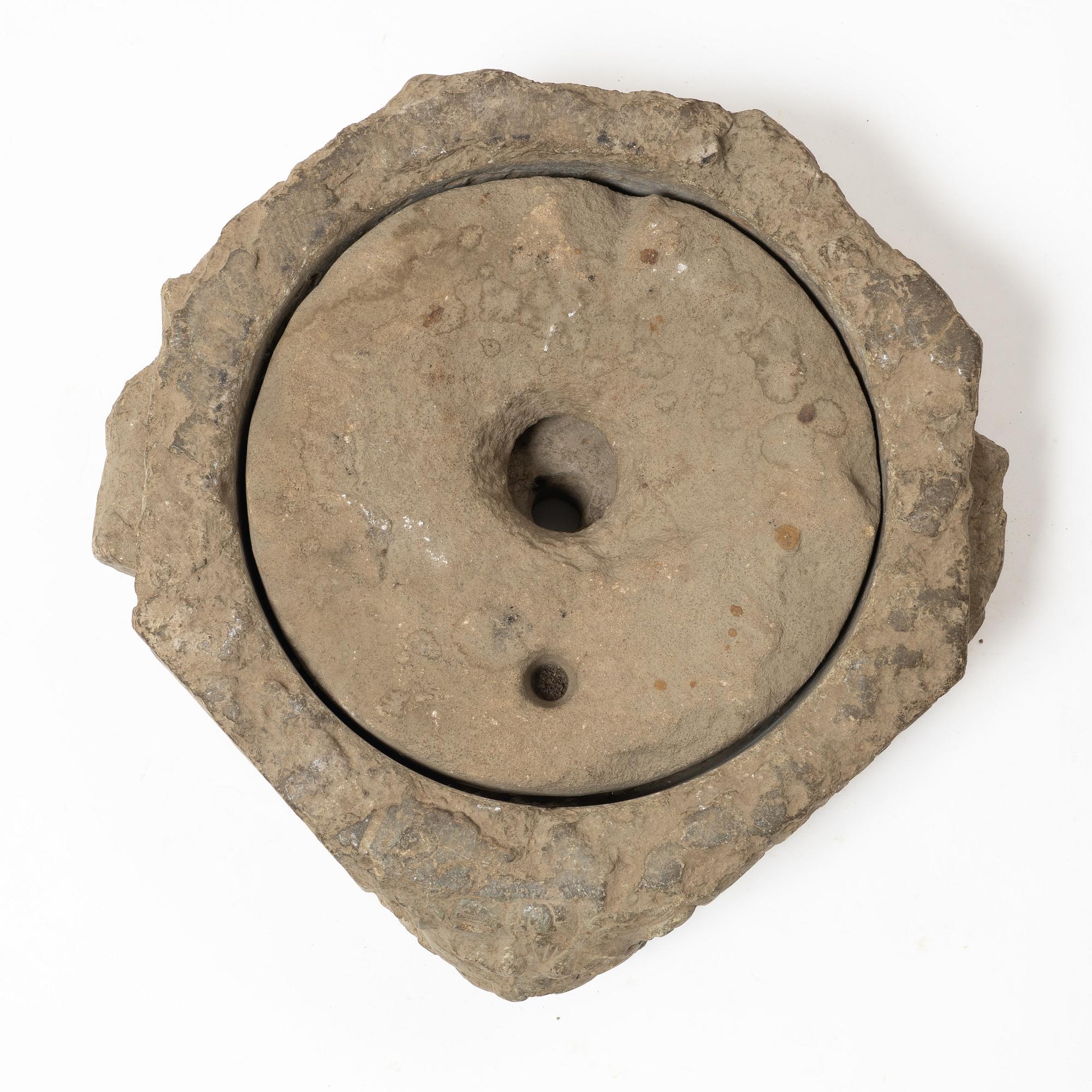 A Swedish grain mill, dated 1673.