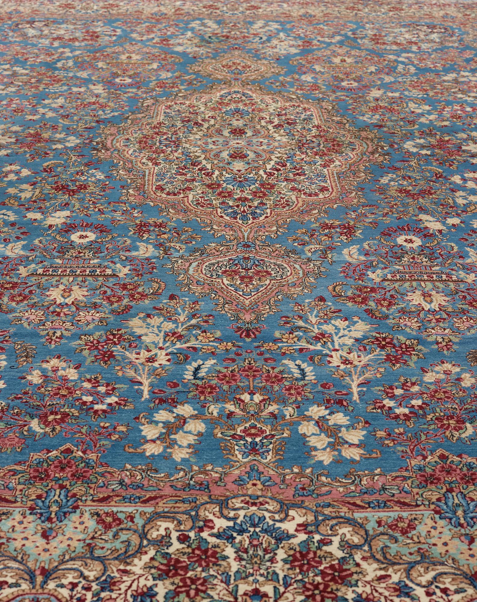 A semi-antique Kerman carpet,  440 x 296 cm.