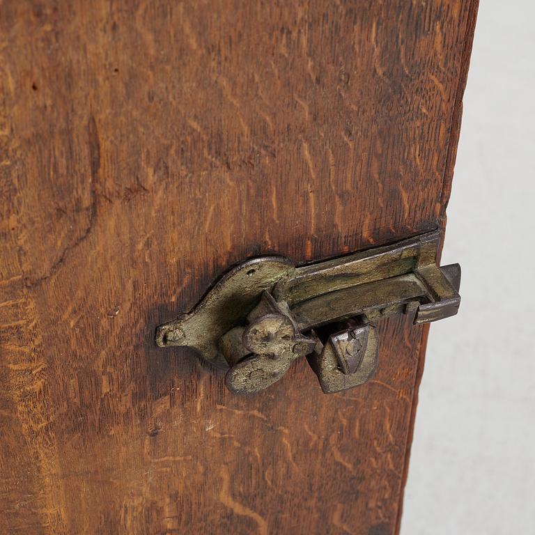 A Baroque corner cabinet, 18th Century.