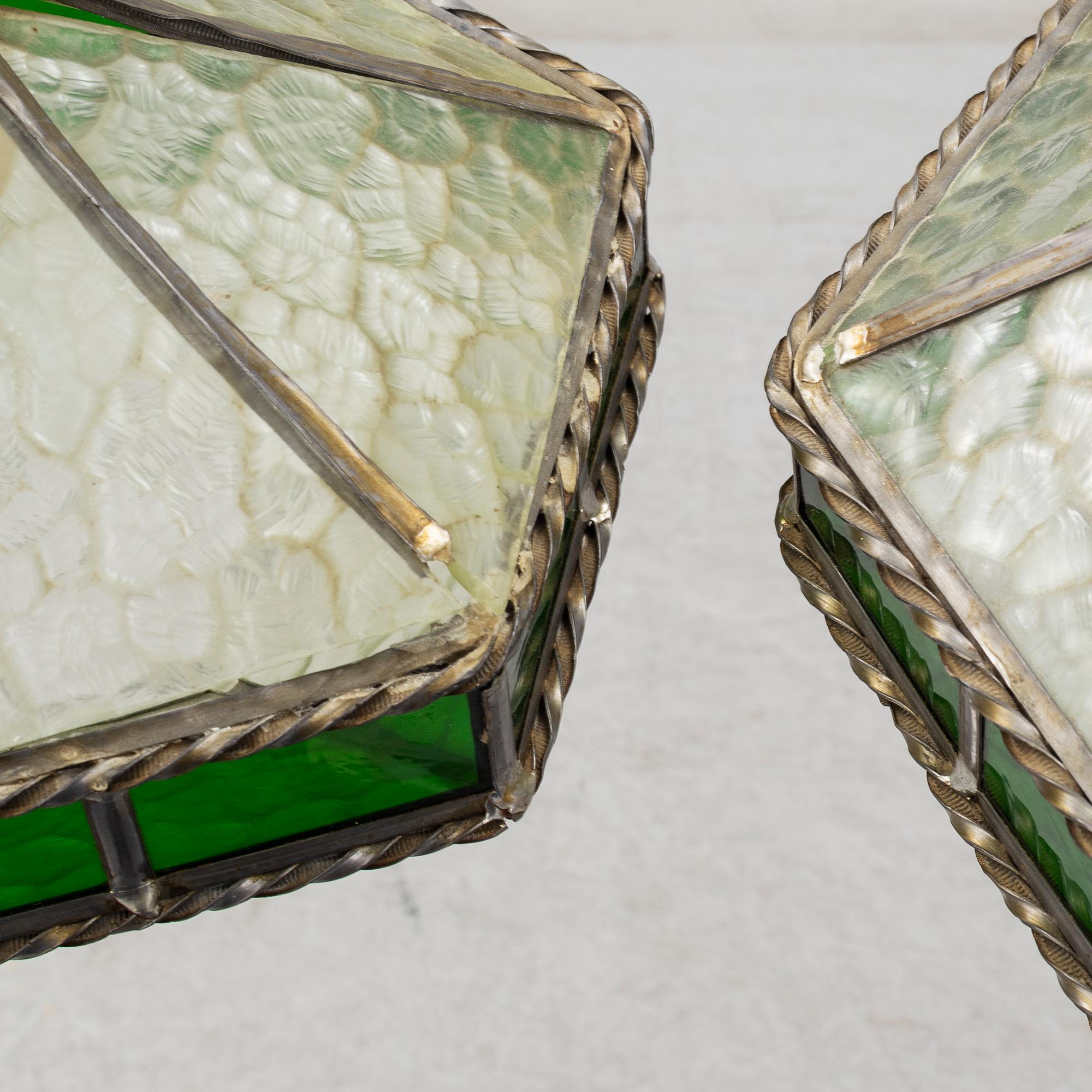 a pair of jugend ceiling lights from the early 20th century.