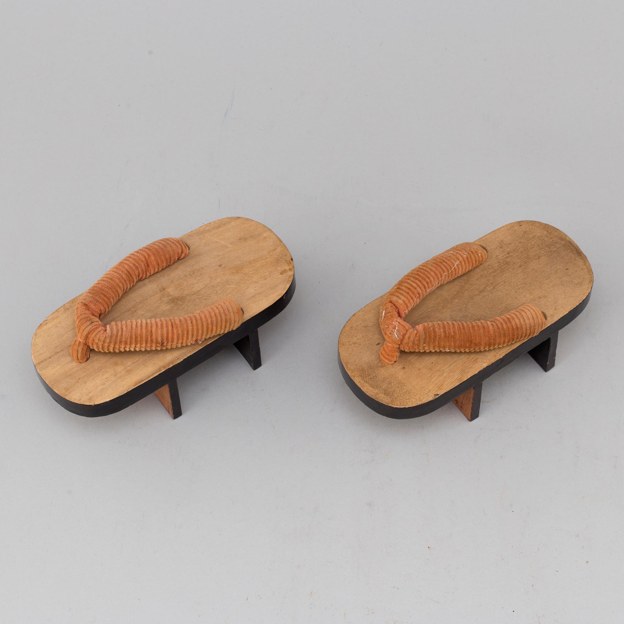 A pair of Japanese 'Geta' shows and two Chinese pouches, early 20th century.