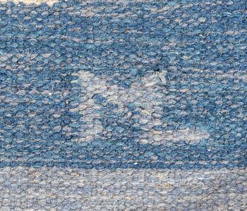 A Swddish flat weave  carpet signed ML ca 192x143 cm.