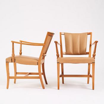 Josef Frank, a pair of mahogany easy chairs, Svenskt Tenn, Sweden 1940-1960s, model 2067.