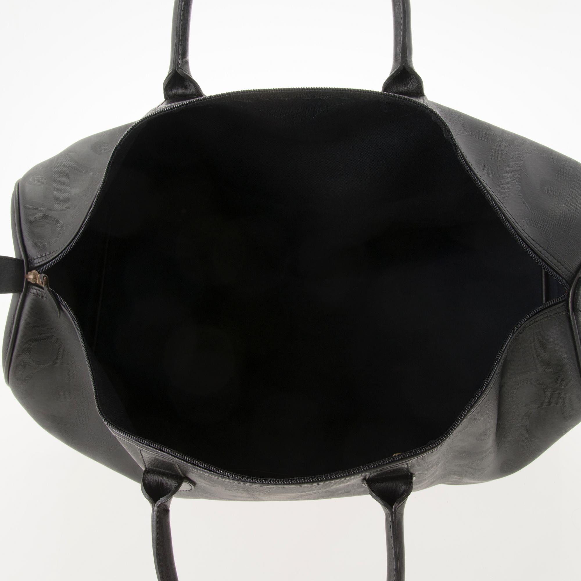 CHRISTIAN DIOR Black Monogram Coated Canvas Duffel Bag.