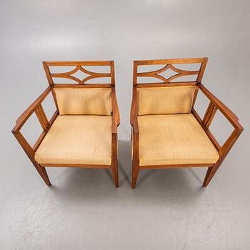 A pair of armchairs around 1900.