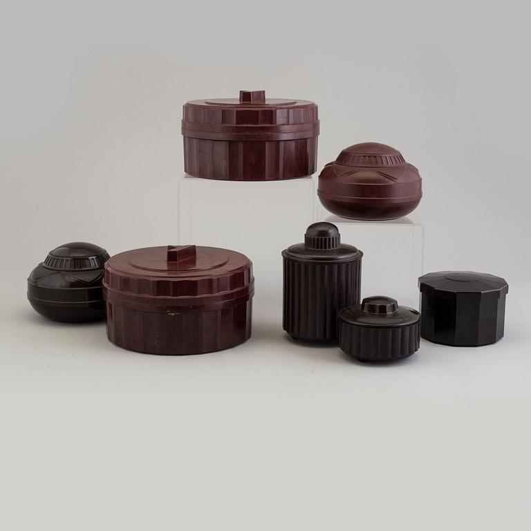a set of 7 bakelit boxes from France, 1930's.
