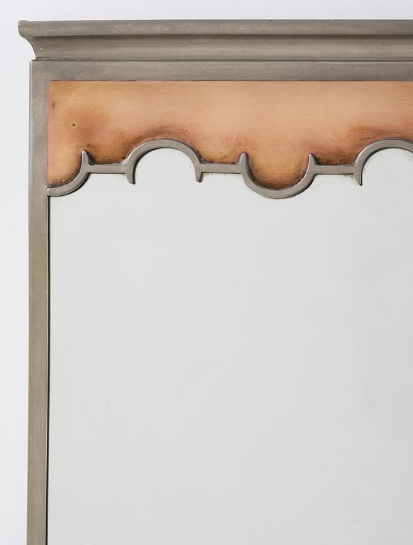 Nils Fougstedt, a rare pewter and brass wall mirror model A 679, Firma Svenskt Tenn, Stockholm, 1932.