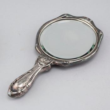 A silverplate toiletrie set, 2 + 4 pcs, early 20th century.