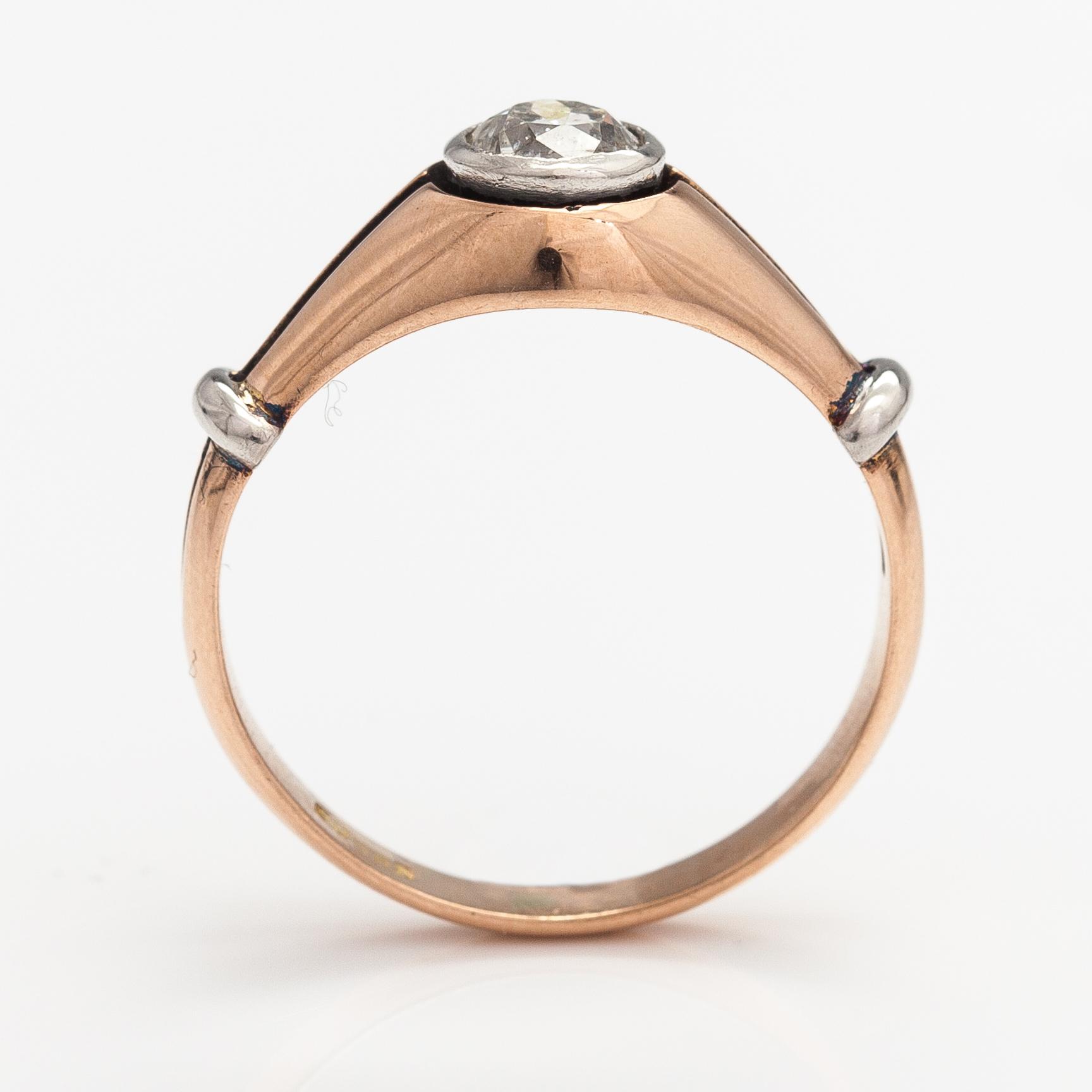 A 14K gold ring with a ca. 0.66 ct old-cut diamond.