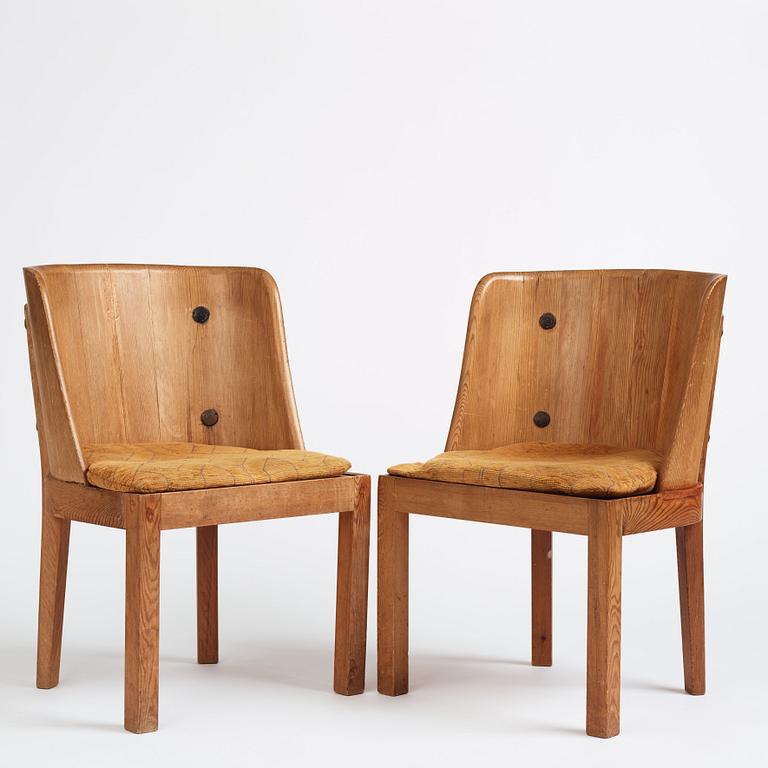 Axel Einar Hjorth, a pair of stained pine 'Lovö' chairs, Nordiska Kompaniet, Sweden 1930s.